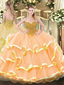 Custom Made Peach Sleeveless Beading and Ruffled Layers Floor Length Quinceanera Gown