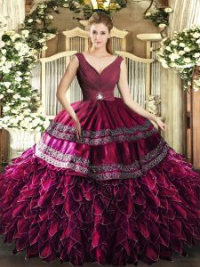  Burgundy Ball Gowns V-neck Sleeveless Organza Floor Length Backless Beading and Ruffles 15 Quinceanera Dress